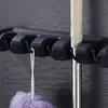 Suport de perete tip organizator pentru maturi si mop, 6 cuiere pliabile, Negru